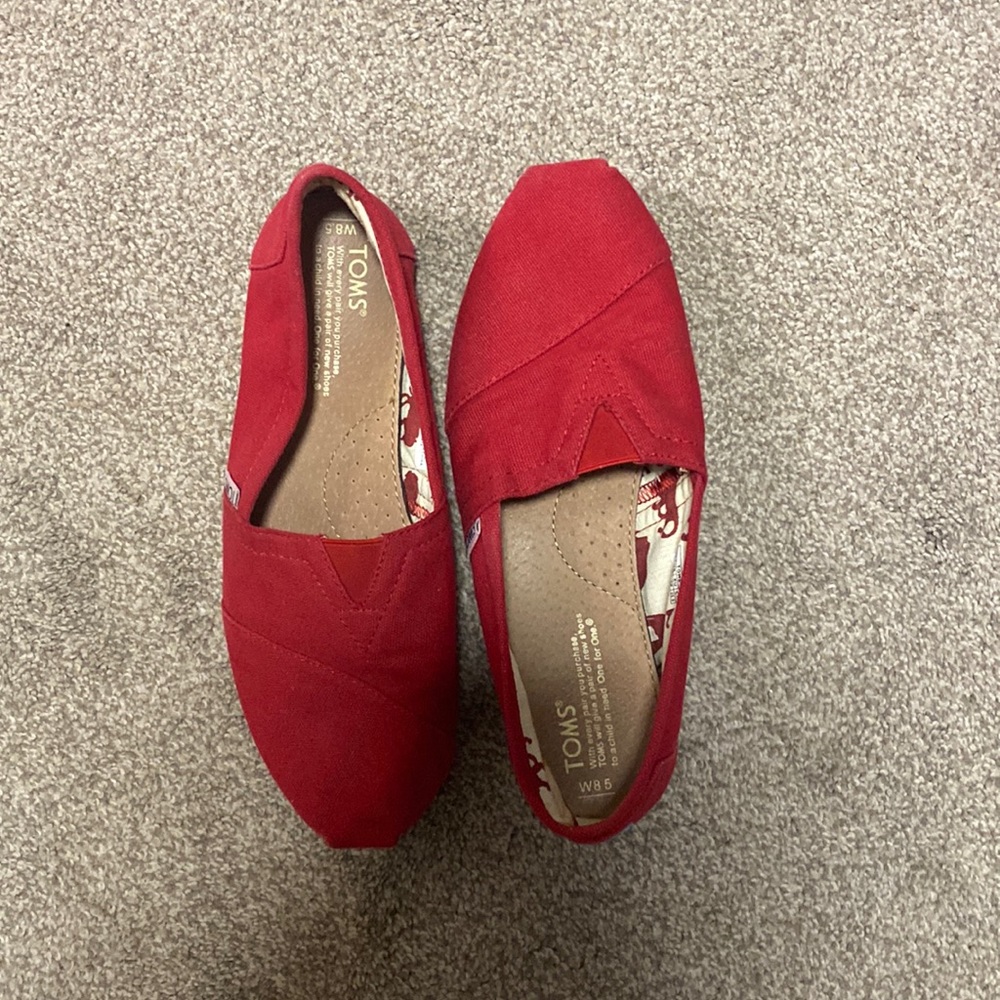 Tom’s size 8.5. Slightly used